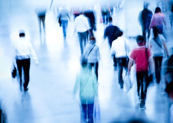 A crowd of people walking.