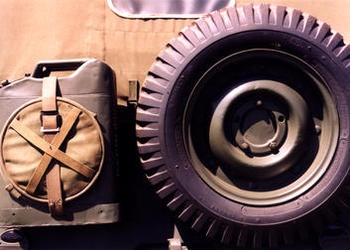 spare jeep wheel and water tank