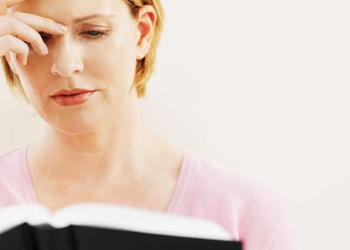 A woman reading the Bible