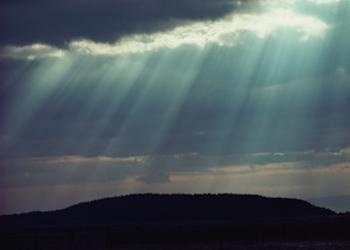 Sunlight rays coming through clouds.