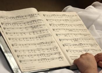 Teaching Children to Sing Hymns in a Church Service 