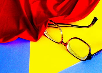 red, yellow, and blue colors and eyeglasses