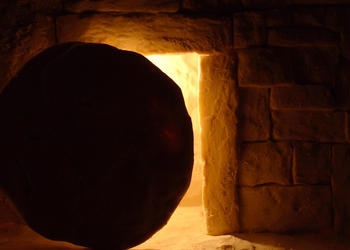 The inside of a tomb looking out.