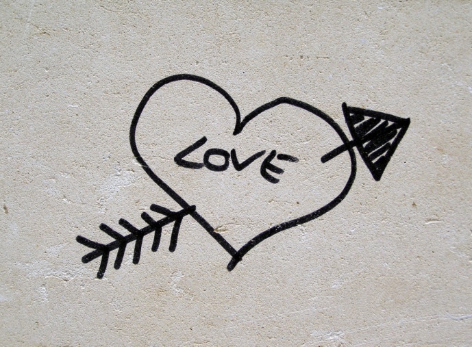 Graffiti heart with arrow and love