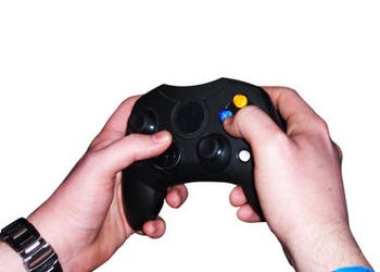 hands holding video game controller