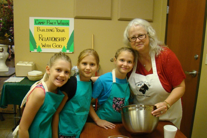 Campers and a staff member at Piney Woods. 