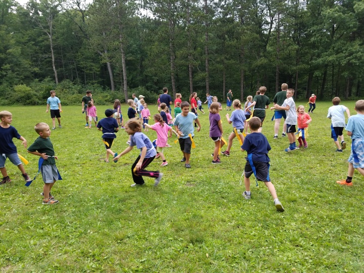 Campers playing a game at preteen camp Seven Muontains. 