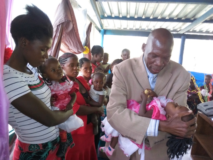 Blessing the children at the Feast in Lusaka, Zambia.