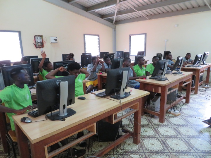 Campers during a computer skills class at UYC's camp in Ghana.