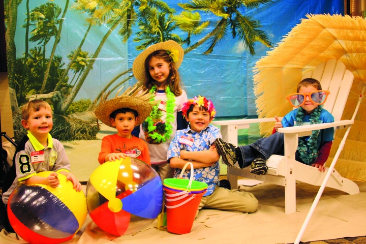 Church members of the Boise Idaho congregation pose for a photo at the Winter Luau Social. 