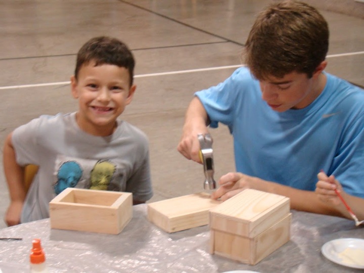 Campers working on a project. 