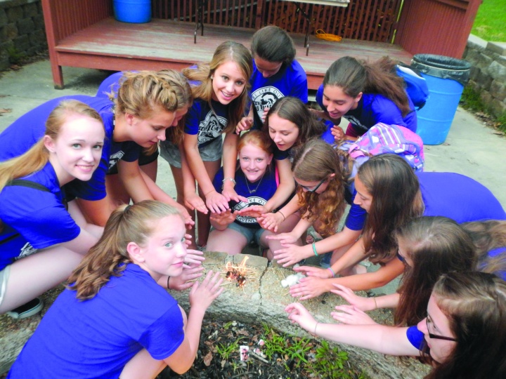 A photo of a group of campers partaking in the Amazing Race game.