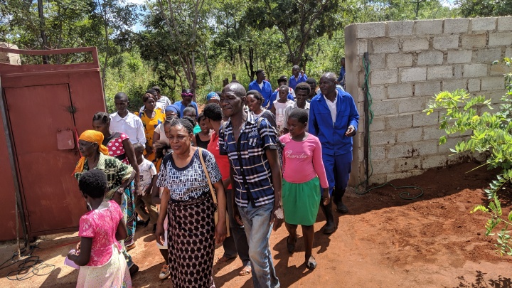 Members enter the church property on the day the wall was dedicated on April 21, 2019.