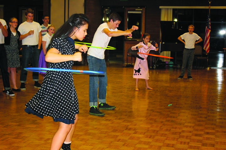 the Los Angeles congregation event had a 1950s theme with a hula hoop contest. 