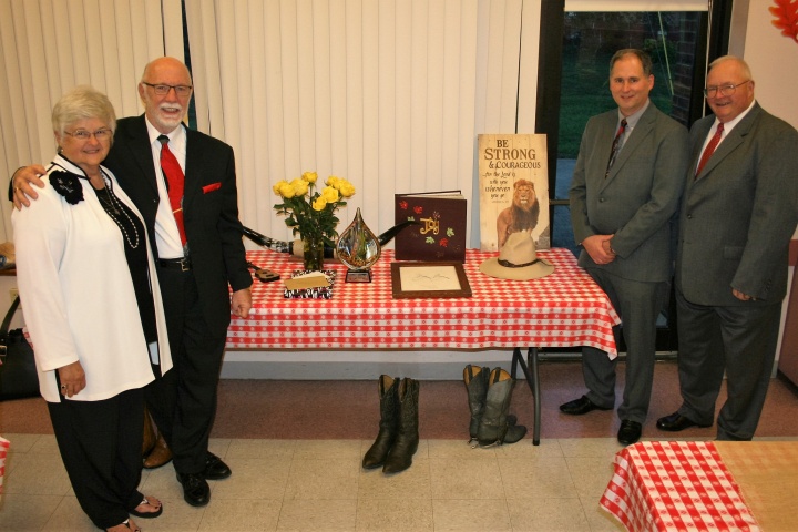 The McCradys (on the left) with Ron Barker and Dave Hemsley (on the right) who presented the gifts to the McCradys.