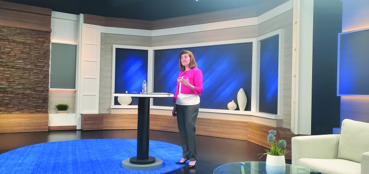 Photo of Julie Brown presenting an analysis of the results.