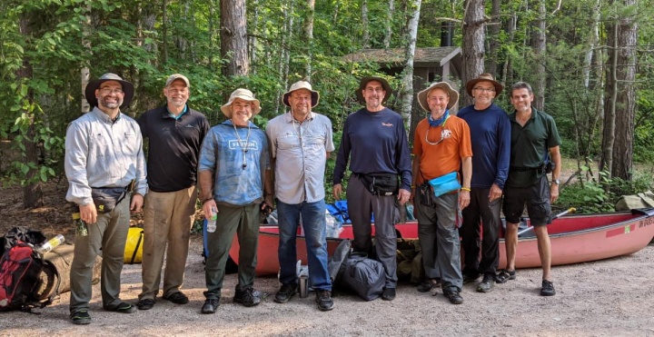 Chris Rowland, Paul Moody, Mark Welch, Michael Fike, Doug Wendt, Jeff Lockhart, Skeets Mez and Frank Dunkle after completing their adventure in the Boundary Waters Canoe Area Wilderness of Minnesota.