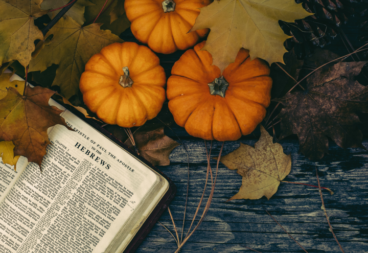 a bible amidst fall decor