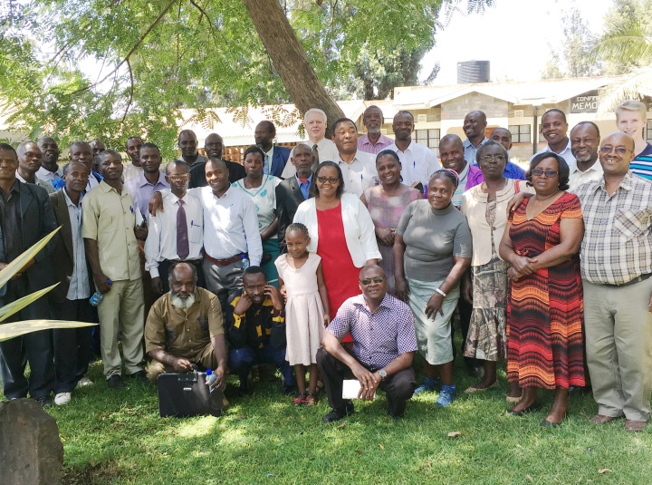 John Elliott with Church members in East Africa. 
