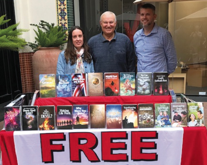 Jennifer Heesch, Mario Seiglie and Bill Carter at the newsstand at Irvine Spectrum Mall.