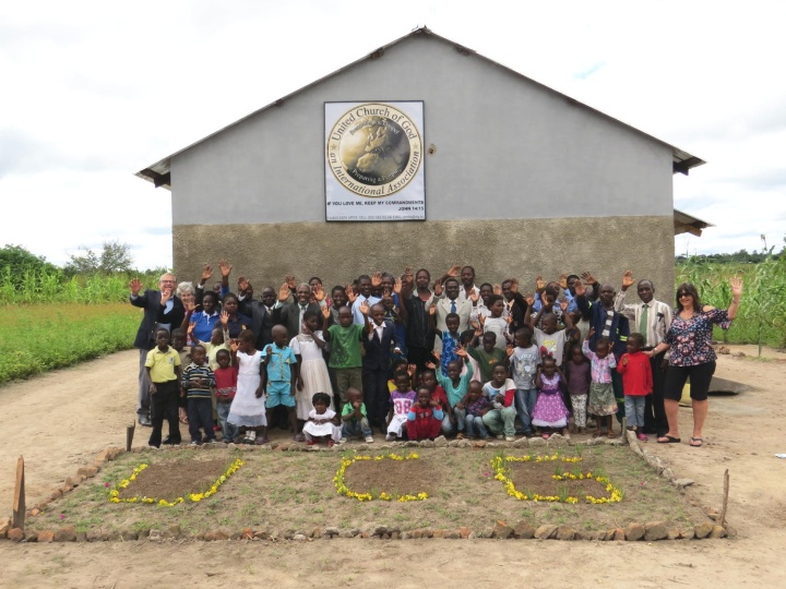 Mufumbwe, Zambia congregation in front of new building. 