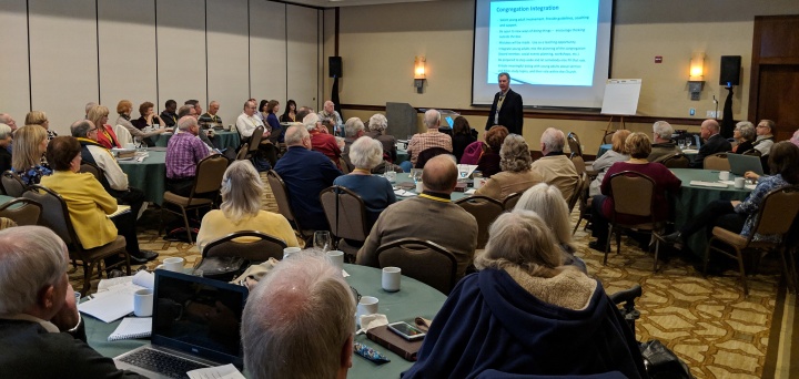 Tim Pebworth leads a discussion during the ministerial conference about how to engage and build relationships with young adults.