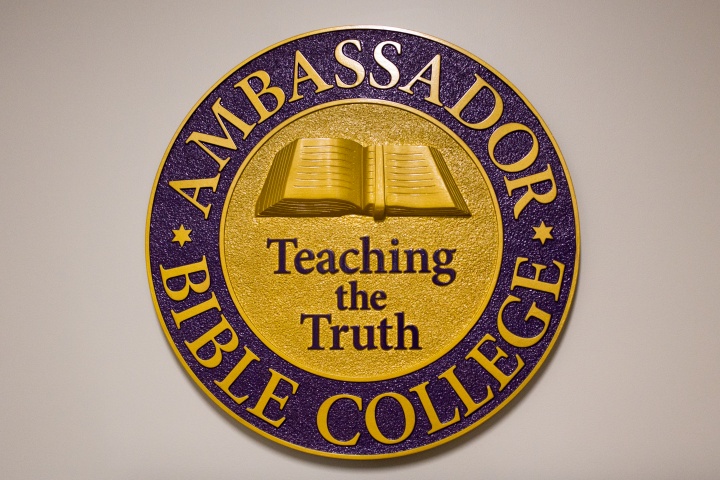 The Ambassador Bible College seal at the entry way.