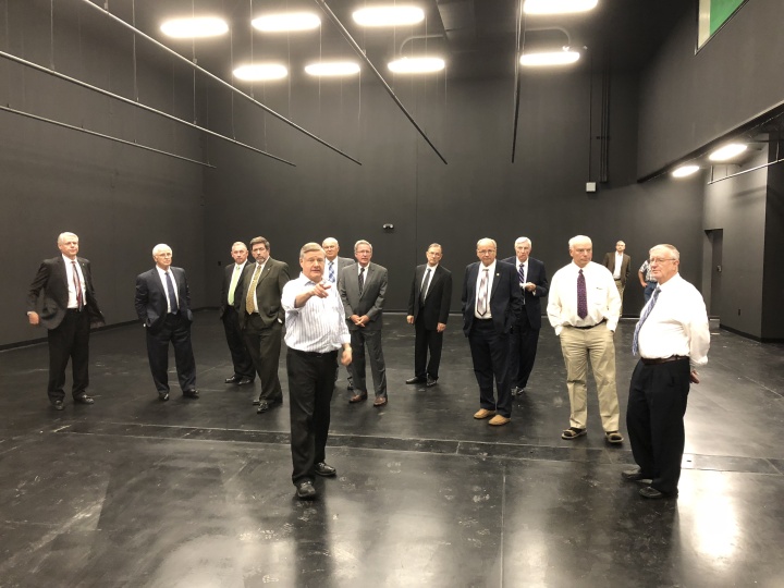 Peter Eddington gives Council of Elders members a tour of the new recording studio space.