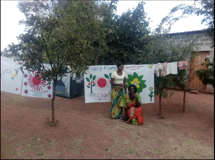 Tablecloths made by the ladies during the enrichment weekend depict the theme, “Arise and Shine.”