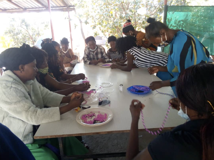 Women learned how to make bead jewelry and doormats at the women’s enrichment weekend in the Copperbelt. 