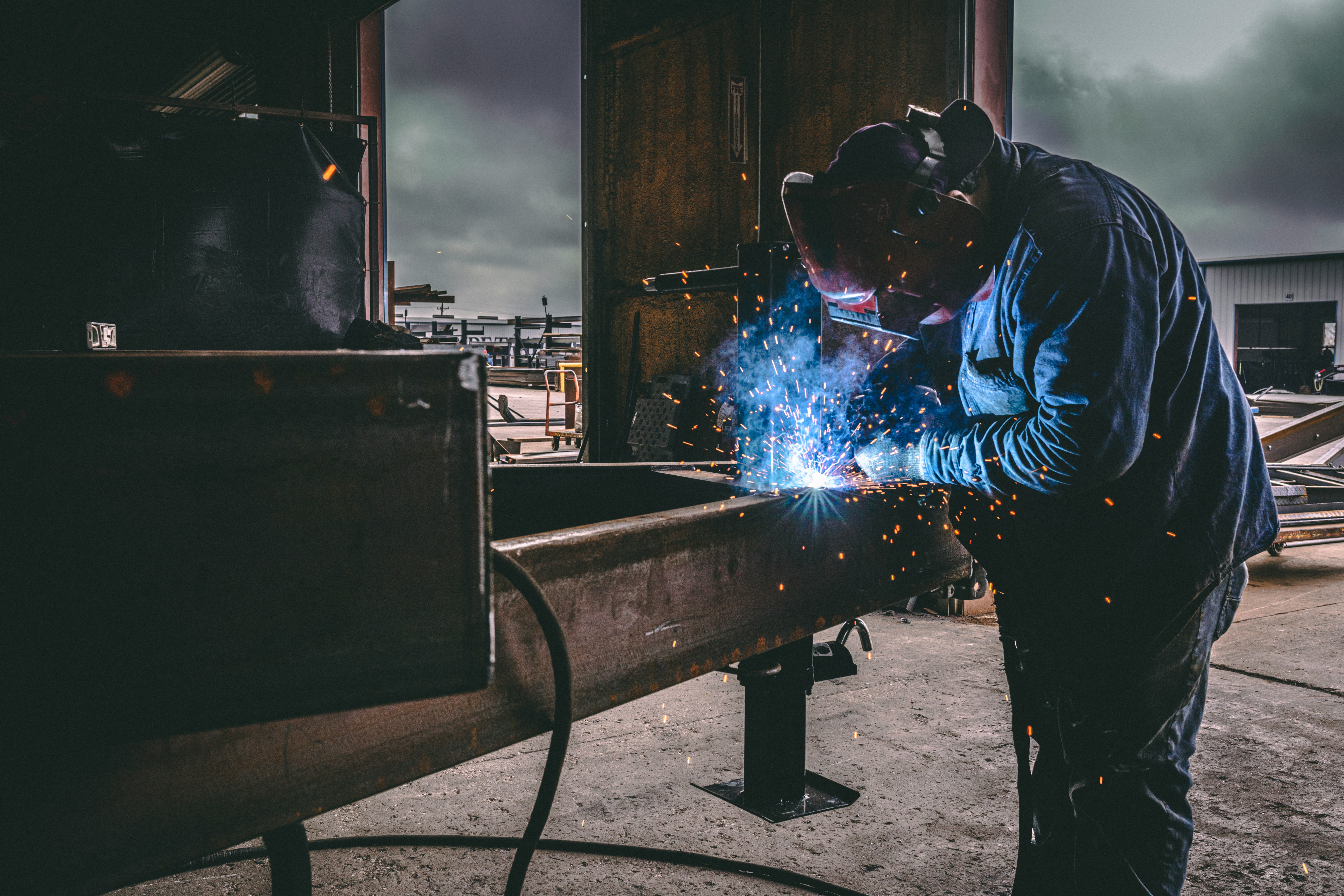 A person welding.