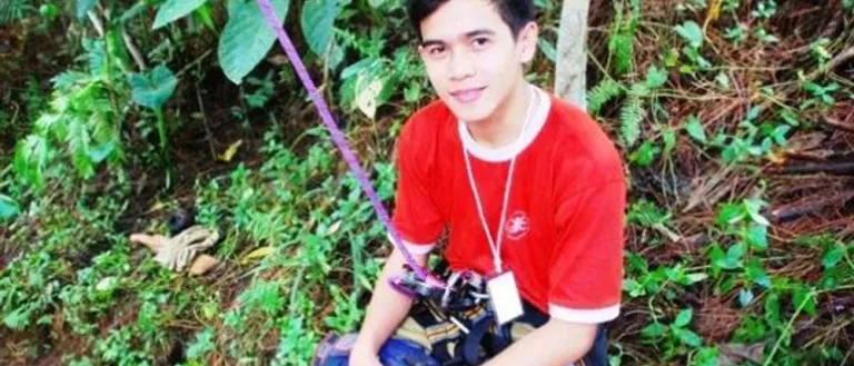 Young man in the Philippines in a climbing harness