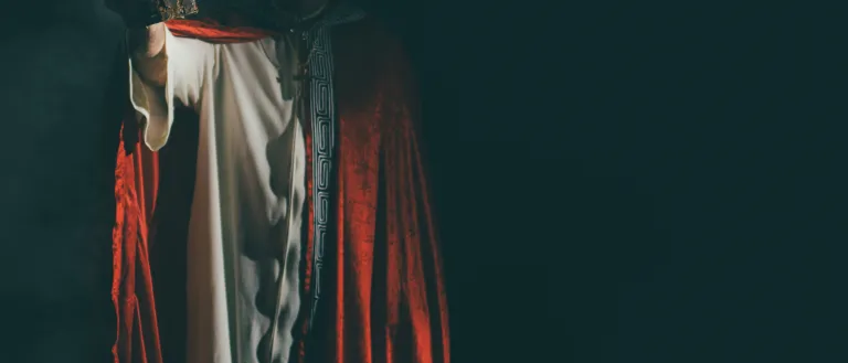 Image of antichrist-like figure holding a Bible.