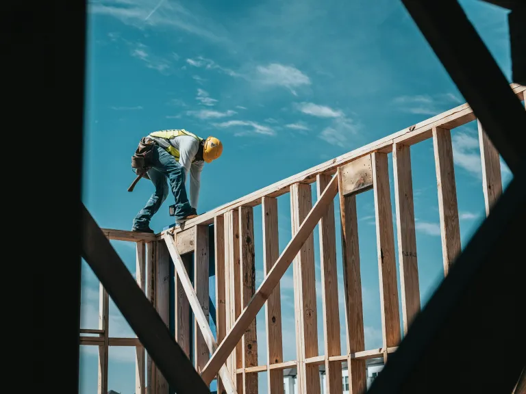 Man framing house