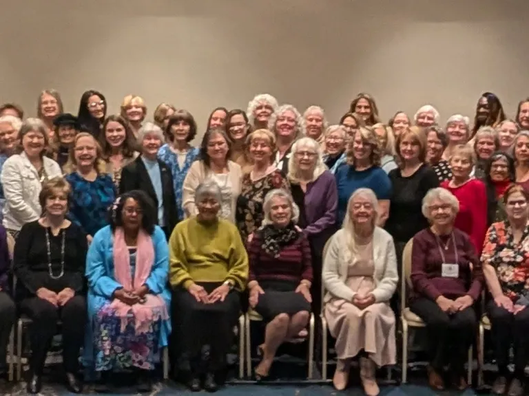 Southern California’s Women’s Enrichment Weekend a large group of women indoors