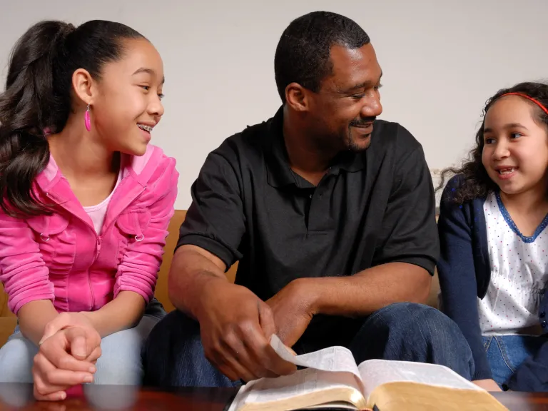 a man and two children
