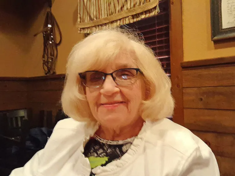 a woman with white hair