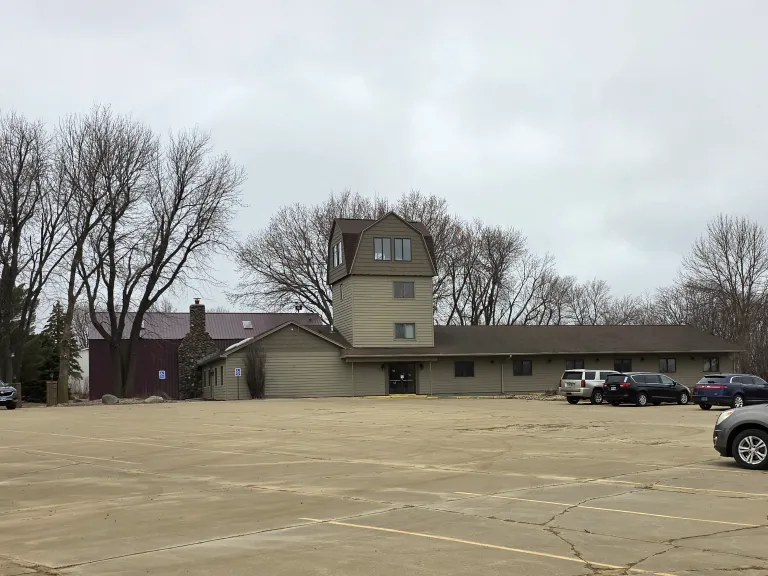 A tan-colored meeting hall