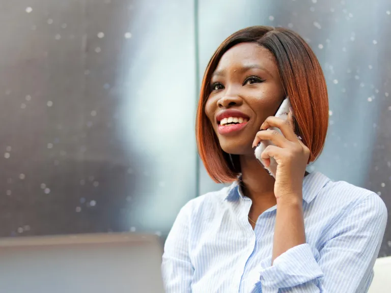 Become "conversational" with God, being always mindful of honoring Him as we address Him. a woman holding a cell phone to her ear