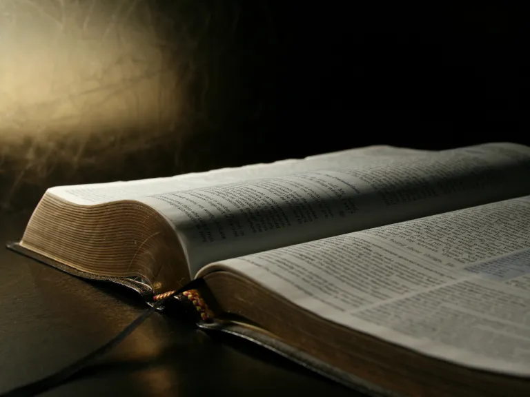 God calls those He chooses out of this society to be part of the spiritual body that is His Church. An open Bible.