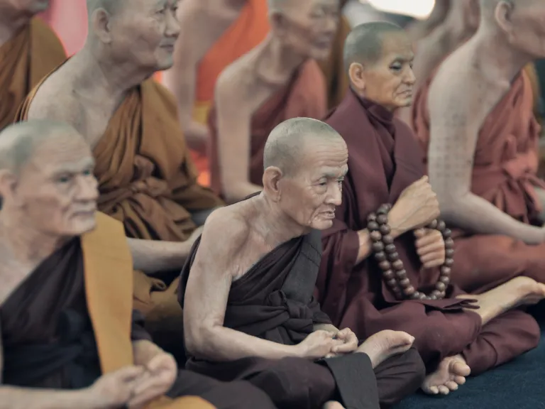Buddhism was founded in northern India about 500 B.C. by Siddhartha Gautama, the buddha. There are currently more than 300 million Buddhists in the world. Buddhist monks sitting on the floor.