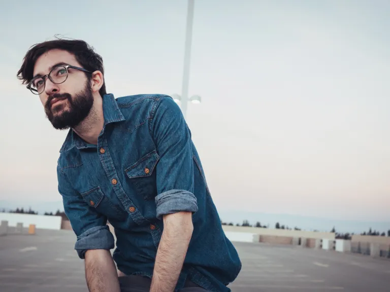 How would you live your life if you knew you only had 24 hours left to live? How do you live your life even if you don’t know when you will die? God reminds us that life is but a vapor. Upclose photo of young man with a beard wearing glasses
