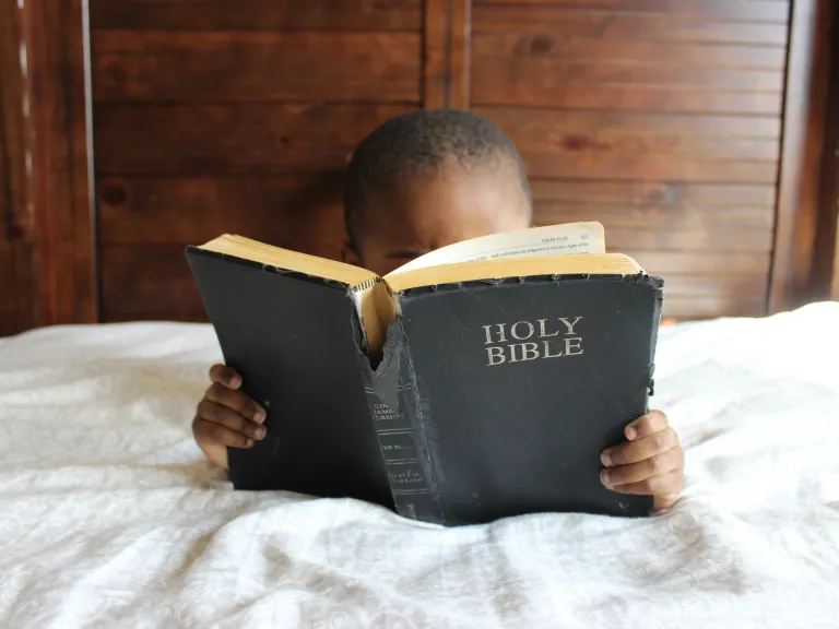 The Bible is true. It is what it claims to be—the inspired, divine, holy revelation of God. A little lying in bed looking at a Bible.