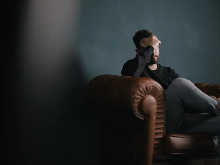 Many have struggled with various problems and sins for years or even decades. Some have become “spiritual casualties.” Fasting helps to prevent this tragedy. A man sitting on a chair holding his head with his hand.