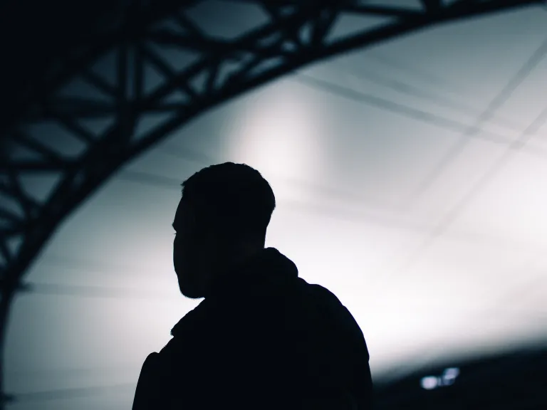 Do we ever wonder why God allows good things to happen to people? Even to people who might not believe the same way you do? A silhouette of young man.
