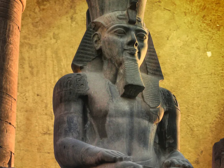 Pharaohs were considered literal sons of Ra or the divine incarnation of Horus. They were thought to embody all of the gods of Egypt and to be their representative to the Egyptian people. Colossus of Ramses II (made in black granite) in the Luxor Temple (Egypt)