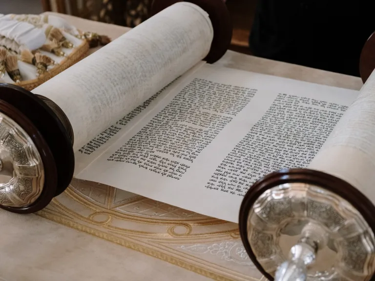 The Sabbaths and annual festivals have never belonged to the Jews; they have always belonged to Jesus Christ and the people of God. a Hebrew scroll rolled partially open to reveal text