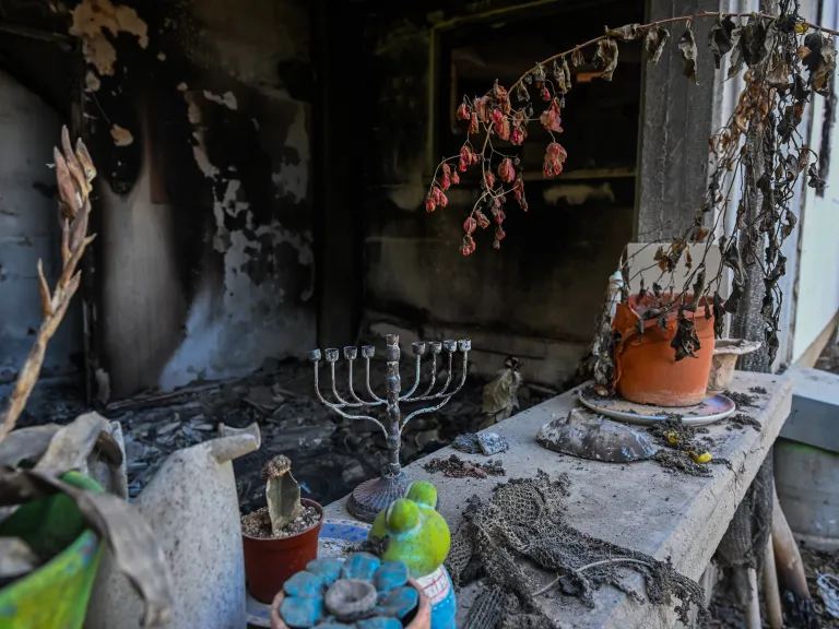 On a sacred Holy Day showing the mercy and compassion of God, Satan unleashed an attack upon the unsuspecting towns of Israel. A burnt house.