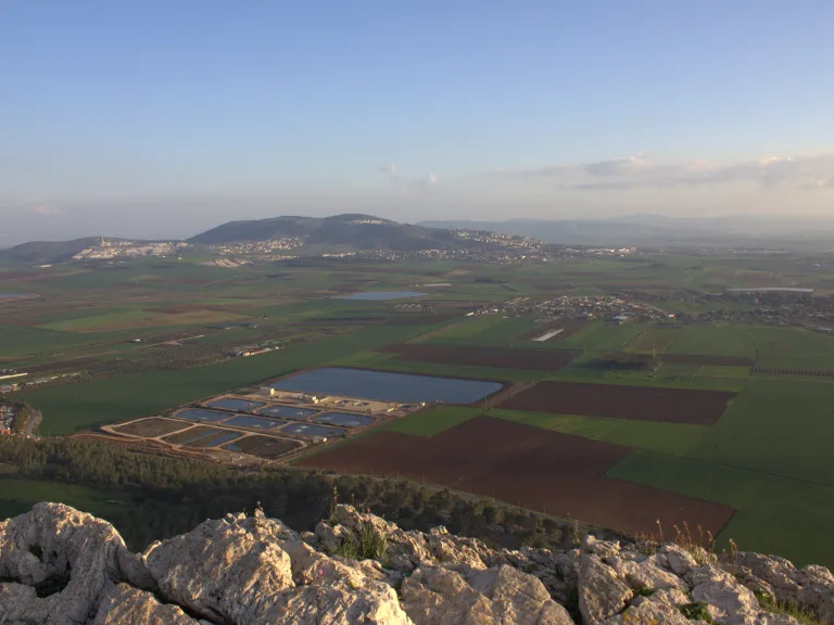 Megiddo overlooked the narrow entrance to Israel's northern mountains from the Plain of Megiddo-also known as the Valley of Esdraelon, or Jezreel-a level expanse some 20 miles long and 14 miles wide. Valley of Jezreel in Israel.