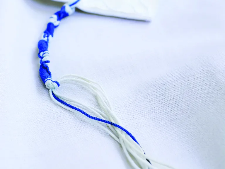 Tassels are a popular Jewish tradition. Tassels are small, knotted cords of strings, usually about six to 10 inches in length, worn about waist high. Tassels are a popular Jewish tradition. Tassels are small, knotted cords of strings, usually about six to 10 inches in length, worn about waist high.